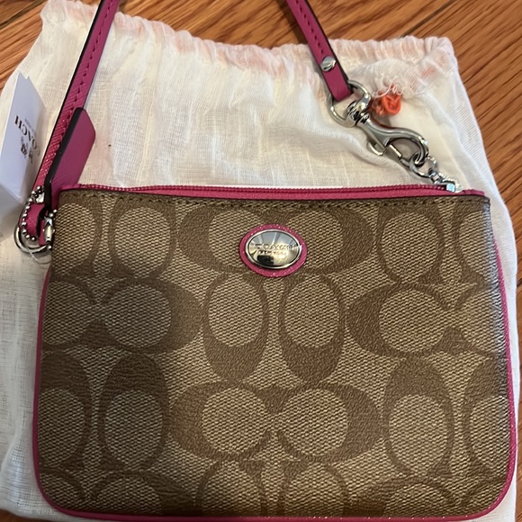 (1070) Coach signature khaki and fuchsia wristlet with silver hardware - Picture 3 of 6
